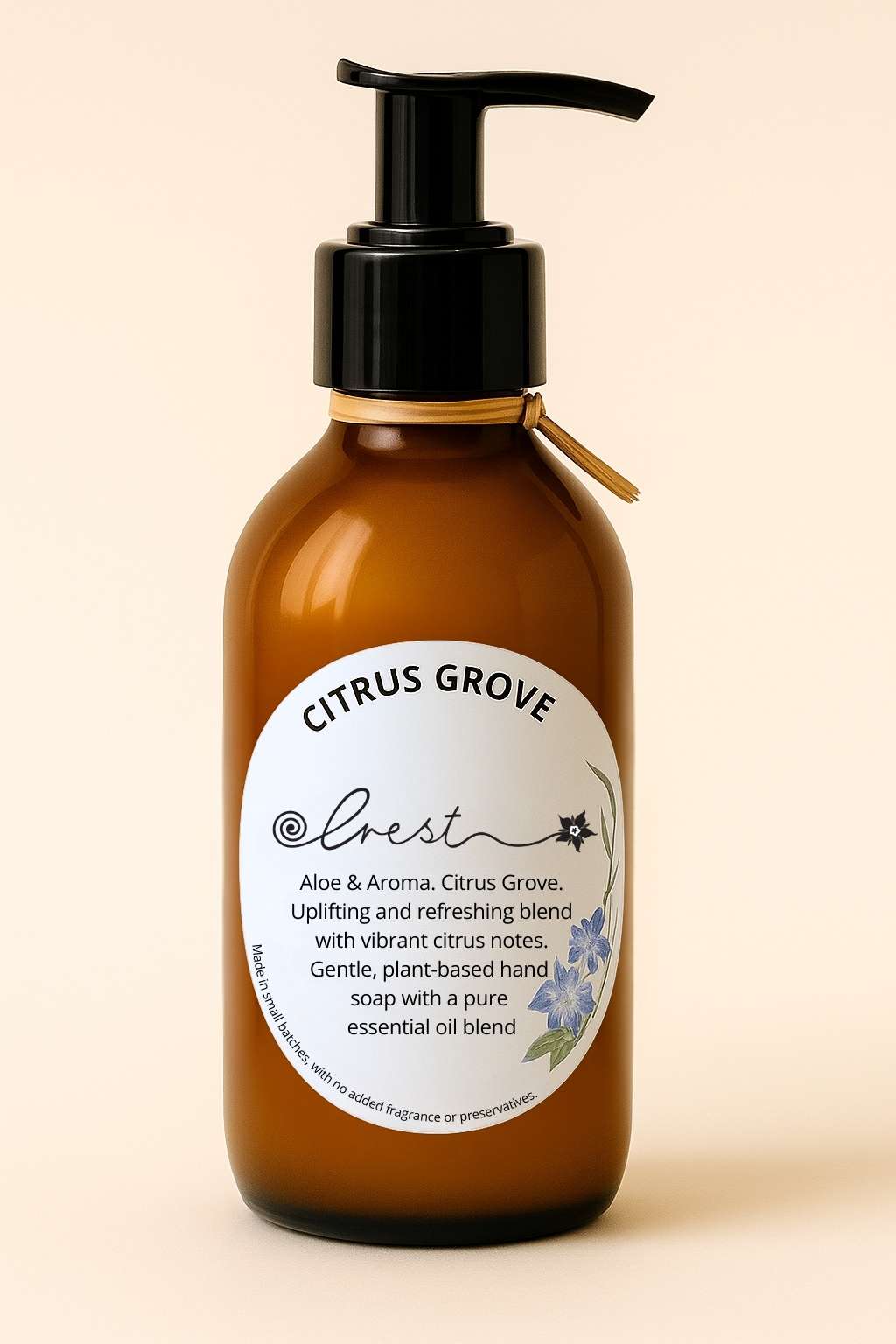 Crest Citrus Grove plant-based hand soap in amber pump bottle with uplifting citrus essential oil blend.