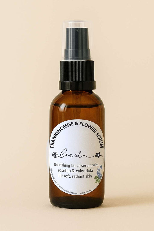 Crest Frankincense & Flower Serum in amber glass pump bottle – nourishing rosehip and calendula facial oil with frankincense for soft, glowing skin.