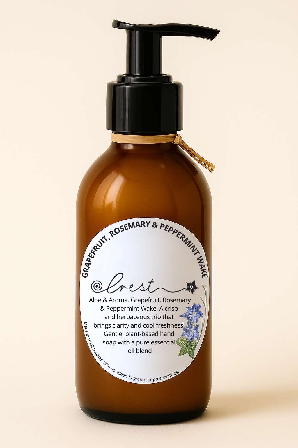 Crest Grapefruit, Rosemary & Peppermint Wake plant-based hand soap in amber pump bottle with refreshing essential oil blend.