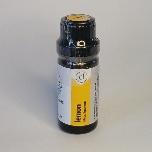 Lemon essential oil bottle by Crest for aromatherapy, diffuser blends and natural home care rituals