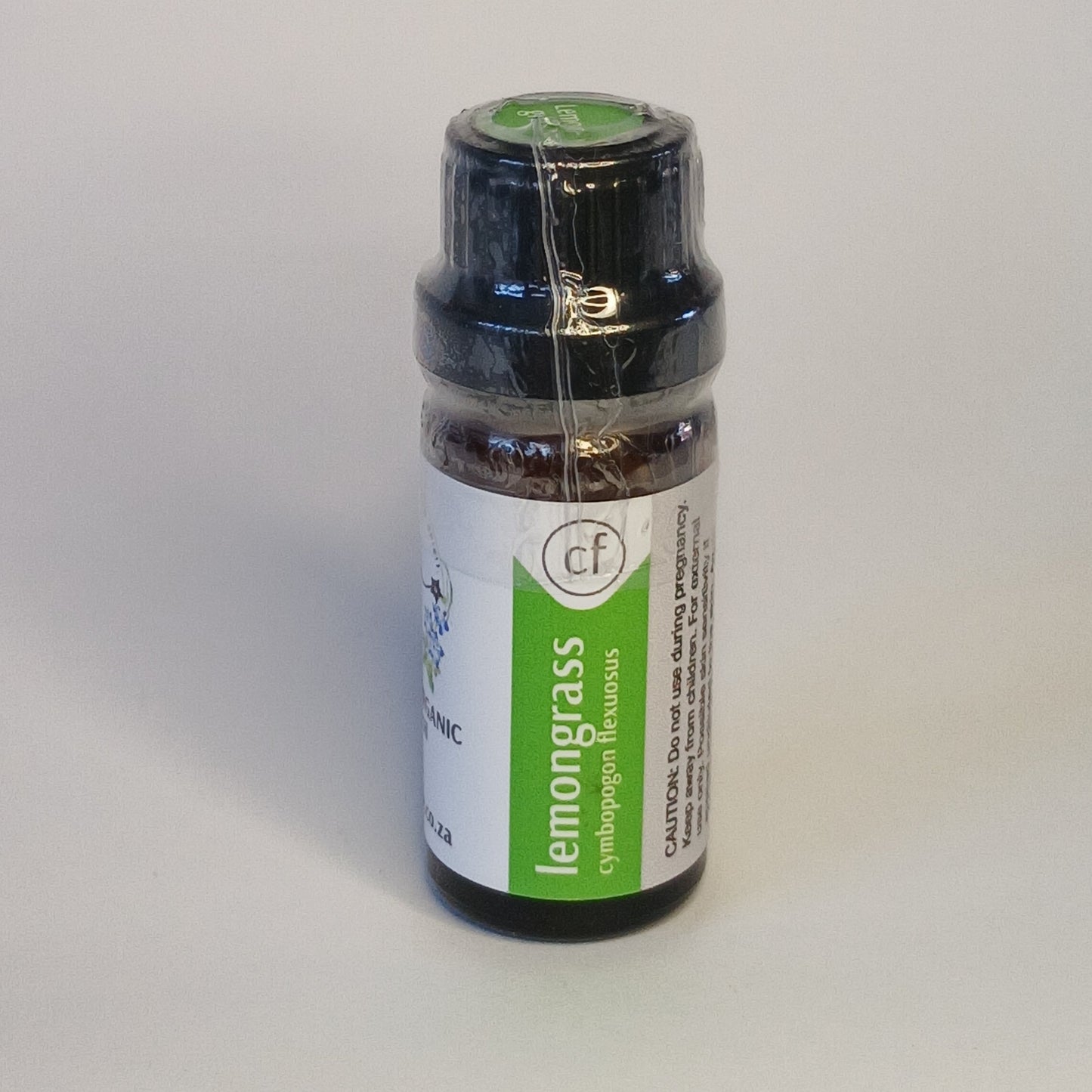 Lemongrass essential oil bottle by Crest for aromatherapy, massage blends and natural botanical home care