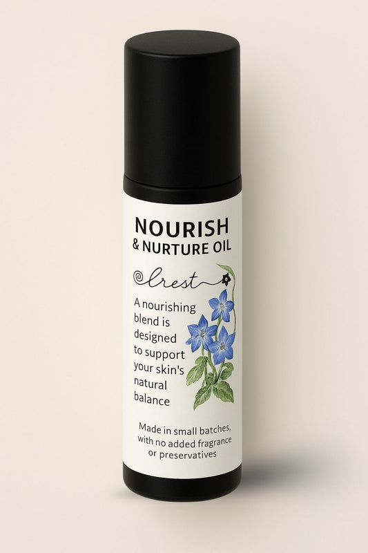 Crest Nourish & Nurture Oil in rollerball applicator – a natural facial oil blend with almond and castor oil, enriched with organic essential oils to support skin’s balance and hydration.