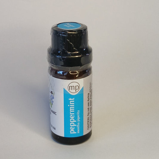Peppermint essential oil bottle by Crest for cooling aromatherapy, focus rituals and refreshing body care blends
