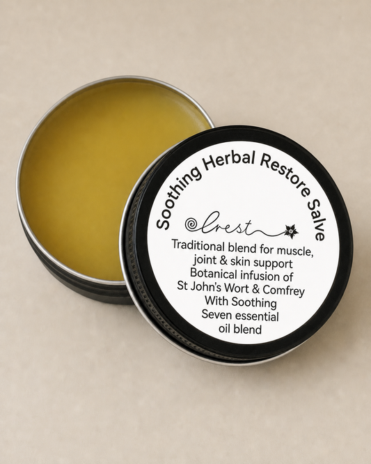 Open metal tin of Soothing Herbal Restore Salve showing golden balm, botanical blend with St John’s Wort and Comfrey for soothing skin and muscle relief by Crest