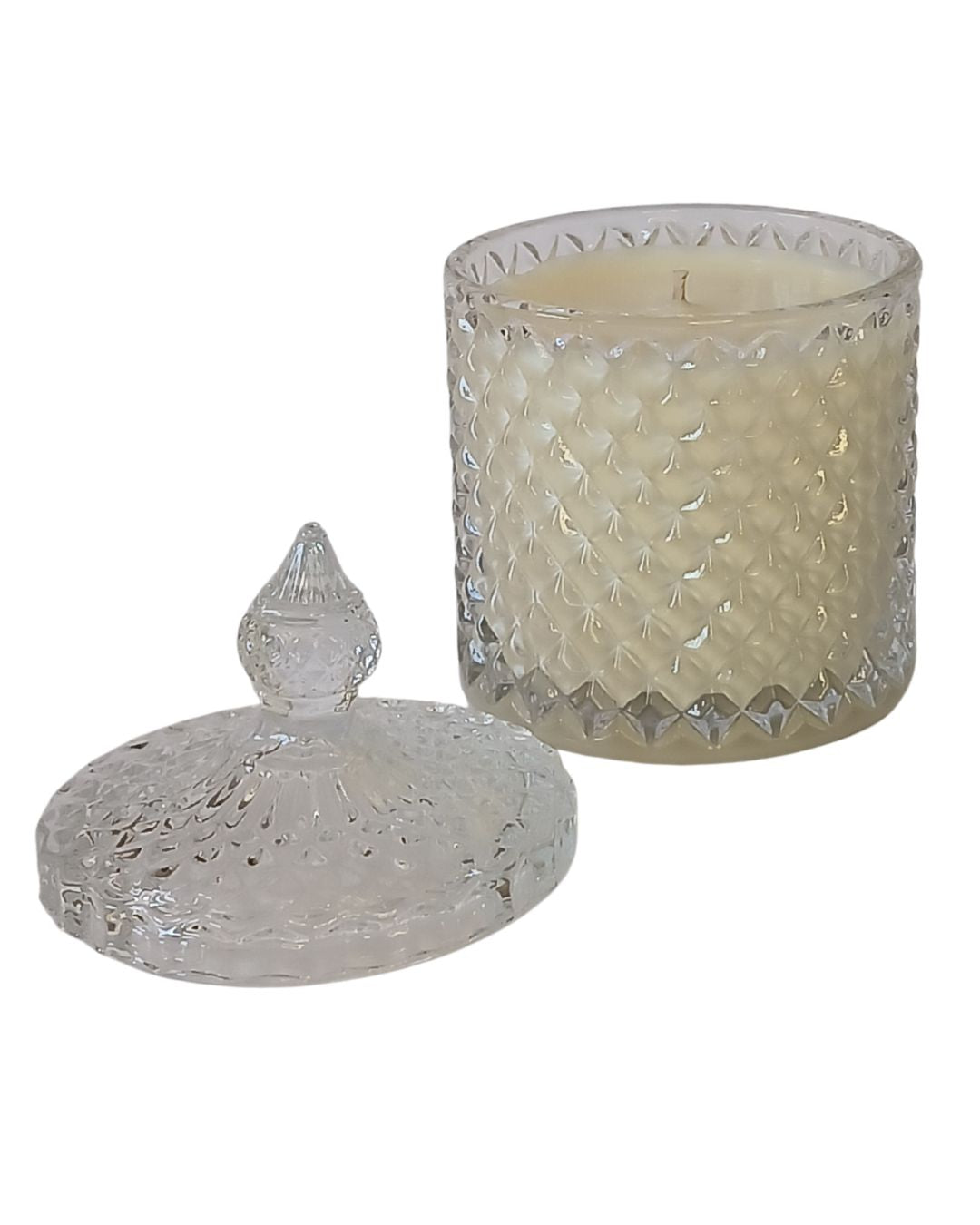 Hand-poured soy massage candle in a decorative container, infused with essential oils from the Crestlife aromatherapy collection. Designed for mood support, skin nourishment, and emotional well-being.