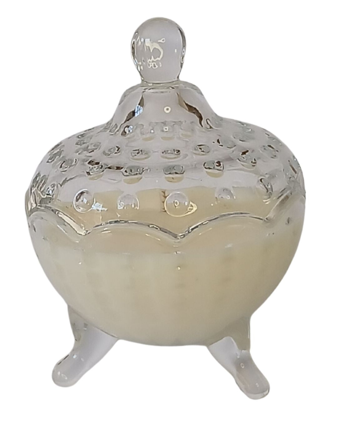 Hand-poured soy massage candle in a decorative container, infused with essential oils from the Crestlife aromatherapy collection. Designed for mood support, skin nourishment, and emotional well-being.
