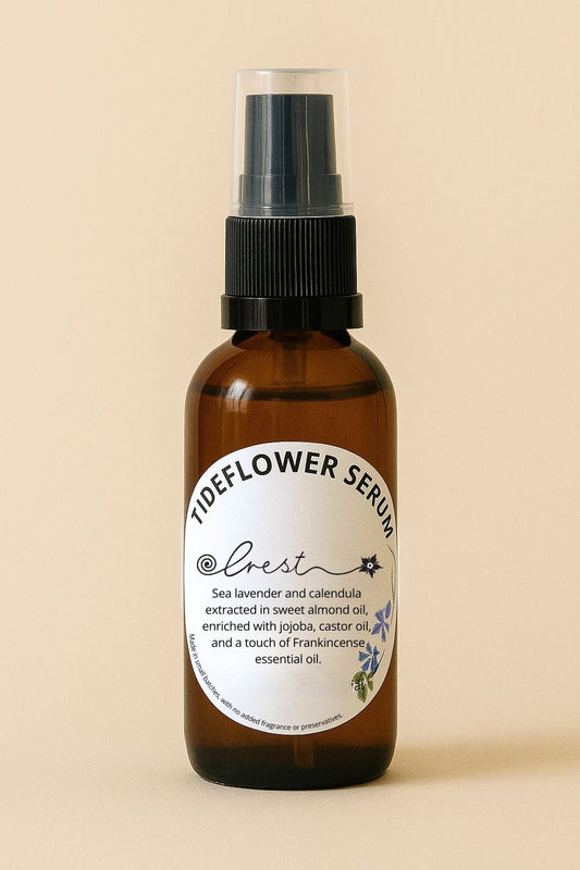 Crest Tideflower Serum in amber glass pump bottle – sea lavender and calendula facial oil enriched with jojoba, castor, and frankincense for radiant skin.