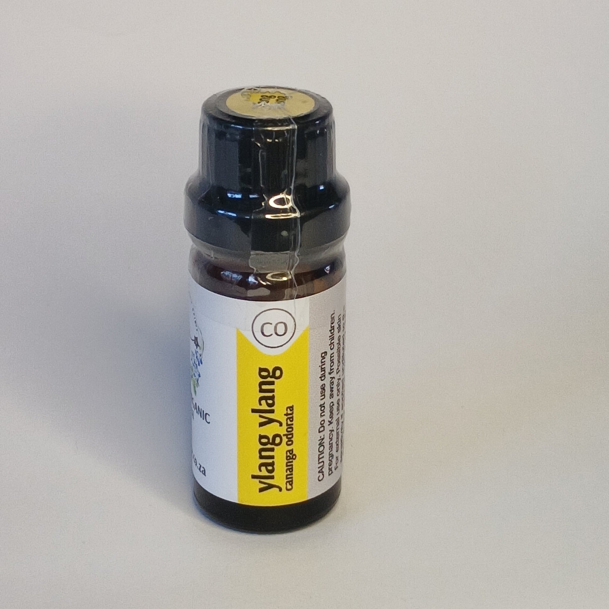Ylang Ylang essential oil bottle by Crest for luxury aromatherapy, floral skincare and botanical perfume rituals